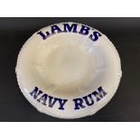A Lamb's Navy Rum ceramic ashtray in the form of a life ring, made by Royal Norfolk, 9" diameter.