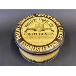 A circular tin advertising Pailin's Original Shrewsbury Cakes, supplied by Phillips's Stores Ltd,