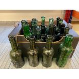 A quantity of glass bottles.