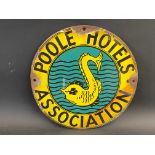 A Poole Hotels Association circular enamel sign with sea creature image to centre, 14" diameter.