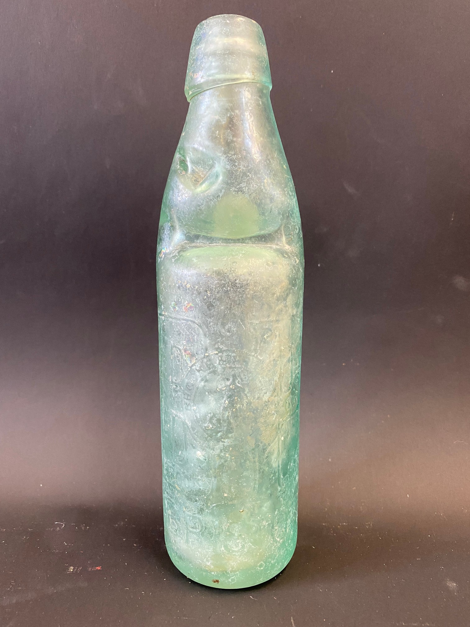 A Brooke Prudencio Ltd of Bristol glass cod bottle.