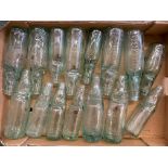 An assortment of glass cod bottles.