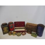 A quantity of large scale shop dispensing tins etc.