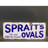 A Spratt's Ovals 'The best little dog biscuit' rectangular enamel sign, 30 x 12".