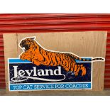 A Leyland Coaches plastic advertising sign mounted on board, 55 3/4 x 33 1/2" overall.