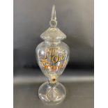 A superb Fine Old Scotch glass lidded dispenser, with outlet for a tap, 27" h overall.