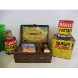 A collection of assorted early tins and packaging, mostly food and baking products including Bird'