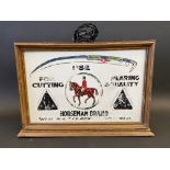 An unusual Horseman brand milk glass fronted illuminated lightbox, advertising scythes, 19 3/4" w