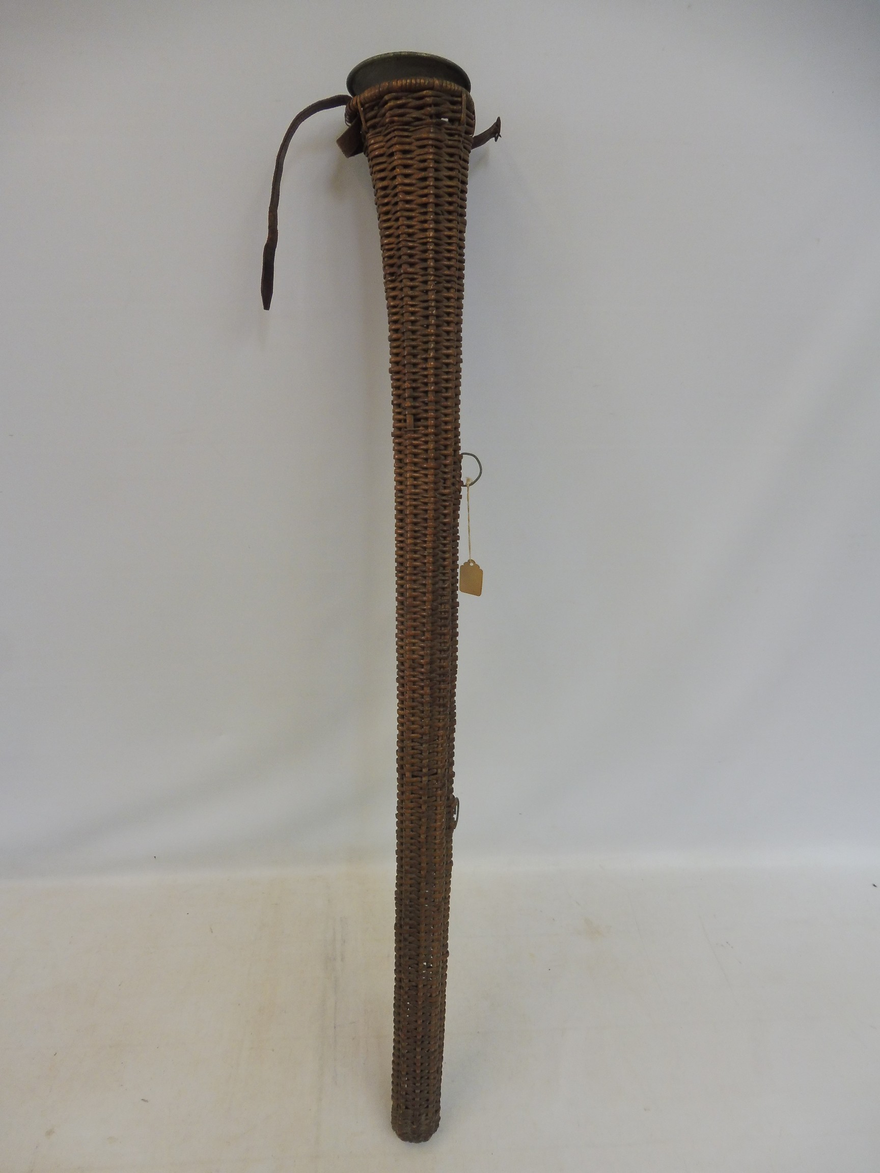 A 19th Century coaching horn, probably Irish, in a wicker case, the horn 37 1/2" long; Provenance - Image 2 of 2