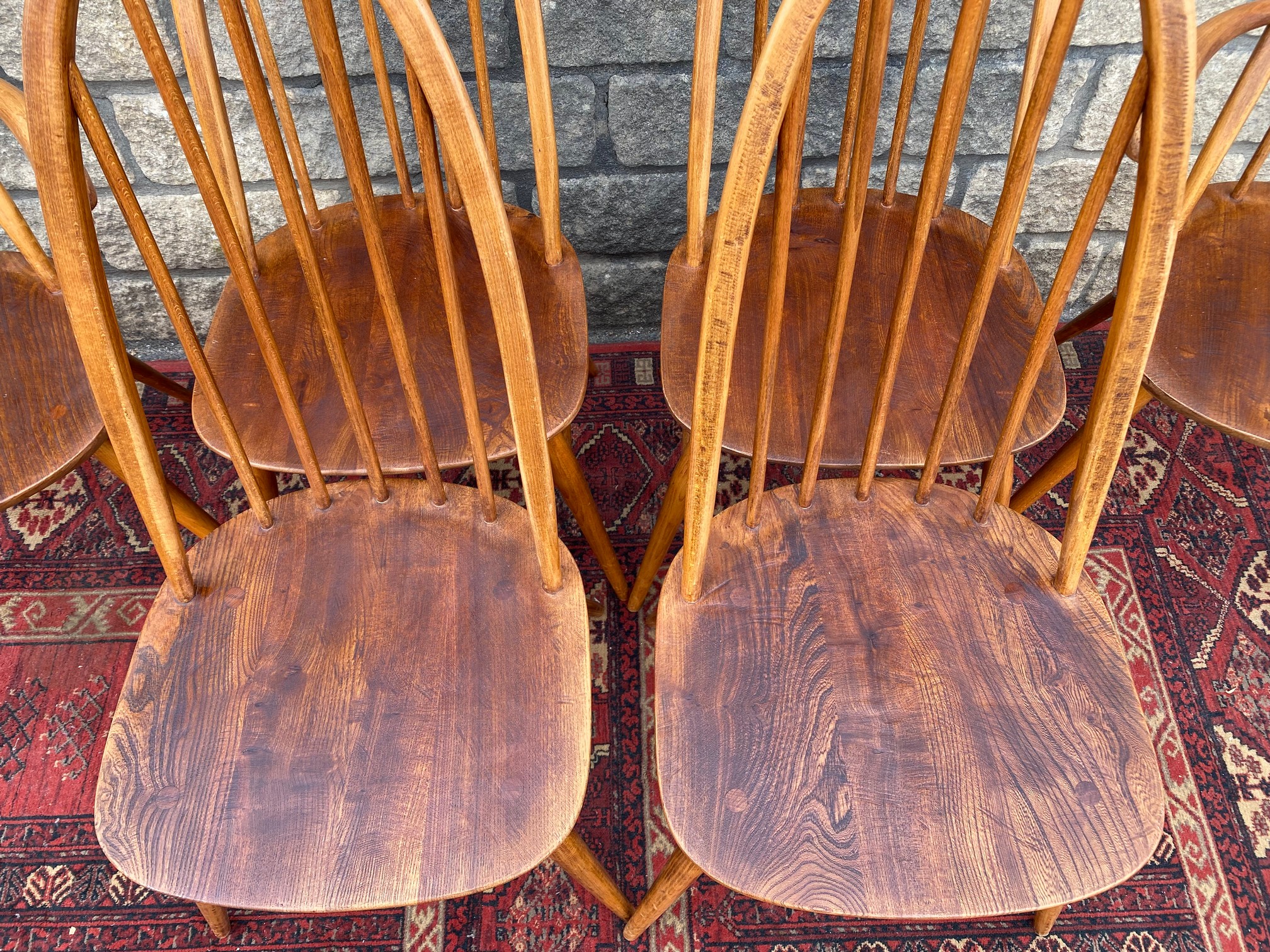 A set of six mid-20th Century Ercol high back dining chairs, two with arms, bearing - Image 3 of 5