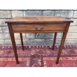 A mahogany rectangular side table fitted with a frieze drawer, 30" w.