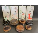 A small collection of Chinese carved hardwood stands; and a set of four painted silk