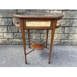 An Edwardian mahogany and inlaid bijouterie table on square tapering supports with spade