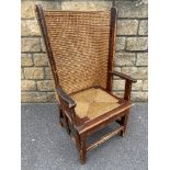 A late 19th/early 20th Century Orkney chair with a woven back and drop in seat.