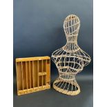 A small shop display cabinet for medical items, 12 1/2" wide; and a wicker bust (half form) (2).