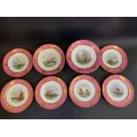 A good quality Minton dessert service, each piece decorated with a different seascape within