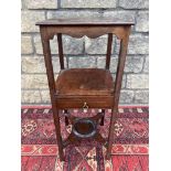 A mahogany three tier side table fitted with a drawer (converted from a washstand), 12" w.