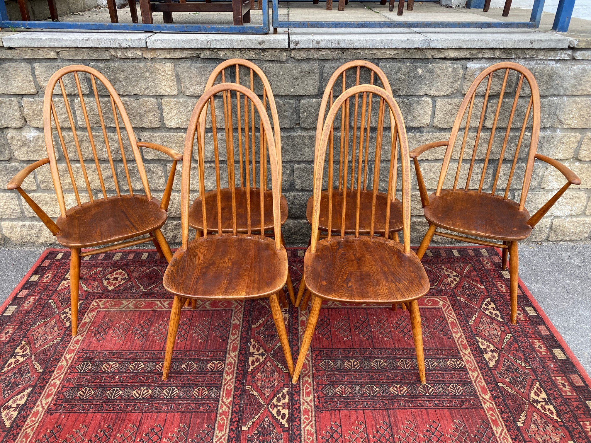 A set of six mid-20th Century Ercol high back dining chairs, two with arms, bearing - Image 2 of 5