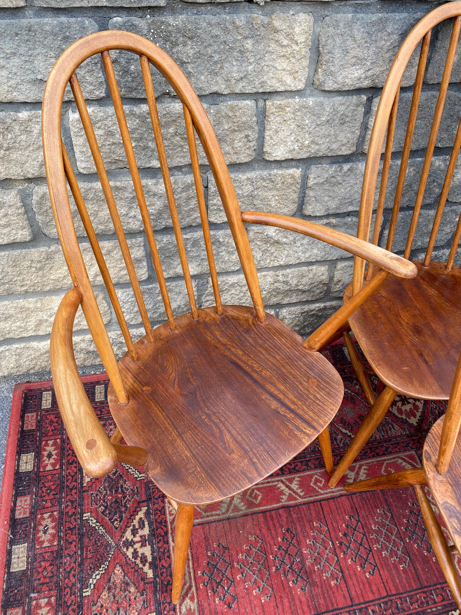 A set of six mid-20th Century Ercol high back dining chairs, two with arms, bearing - Image 4 of 5