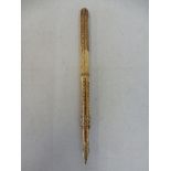 A yellow metal extendable fountain pen by M. Aikin Lamber and Co., no. 4, also stamped MABIE'S
