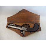 A 19th Century percussion box-lock pocket pistol by J. Dunn with a spring bayonet, the muzzle with