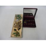 A jewellery box containing six pairs of earrings including gold and a tray of necklaces and