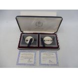 A cased 1977 Queen Elizabeth II Silver Jubilee two coin proof set, comprising a 25 dollar Cayman