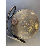 A C. Farlow Mulloch's Patent side caster brass fishing reel.