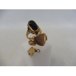 A 9ct gold ring, approx 4.6g, a 14k Sunoco pendant approx 2.4g and a yellow metal mourning ring,