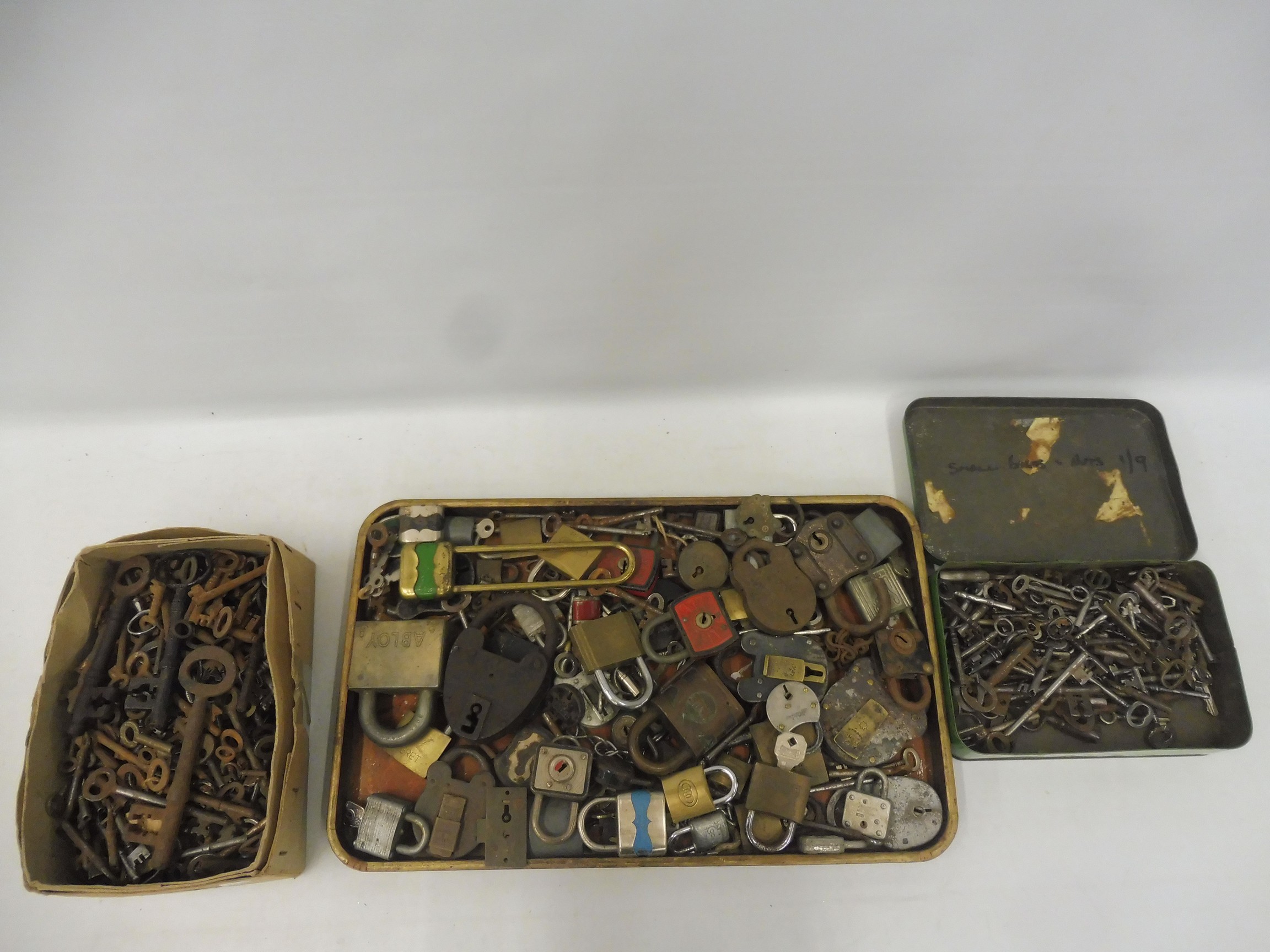 A quantity of antique and vintage padlocks, and keys including Yale, Abloy and Slaymaker.