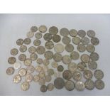 A selection of pre-1948 English silver coins including shillings, florins and crowns, approx. 567.6g