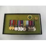 A miniature WWII medal group assembled by Spink & Son Ltd including the Burma Star, a Korean medal