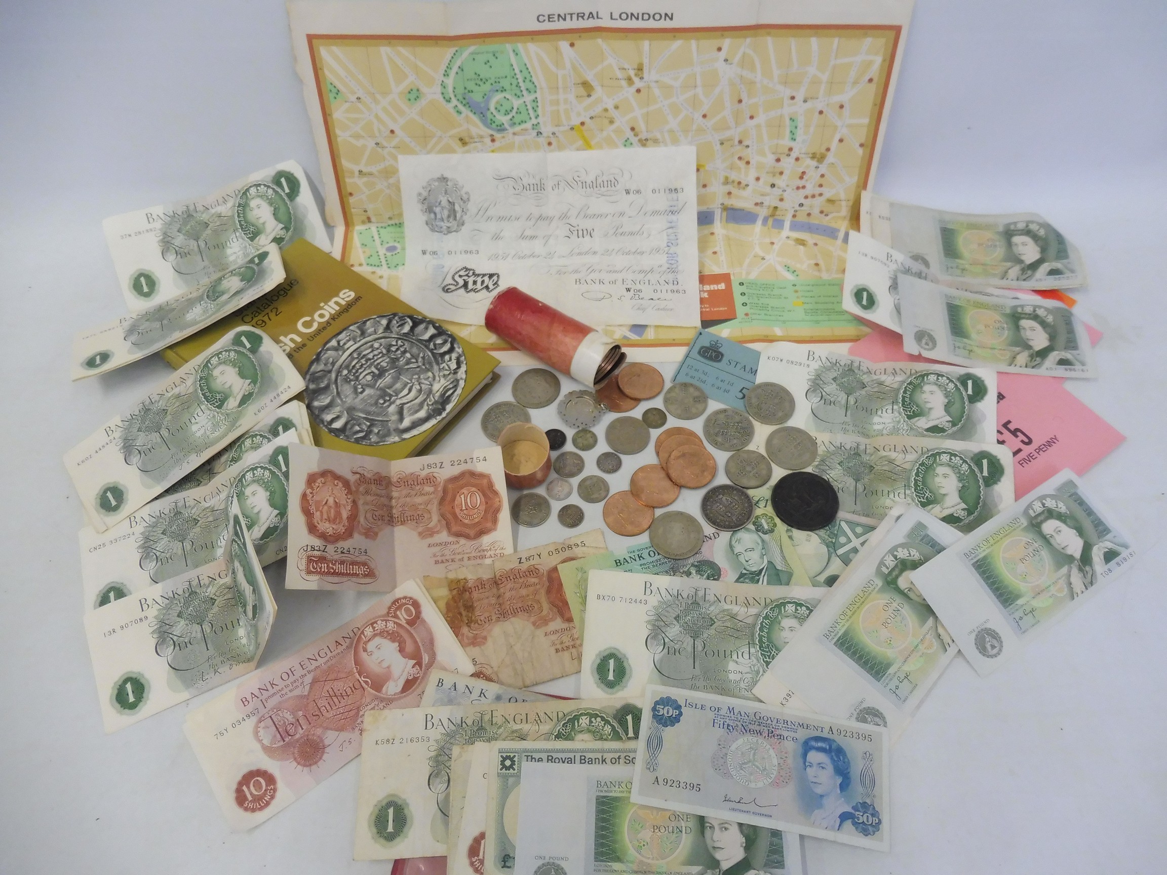 A good selection of £1 notes, some consecutive numbers, an Isle of Man 50p note etc. plus various