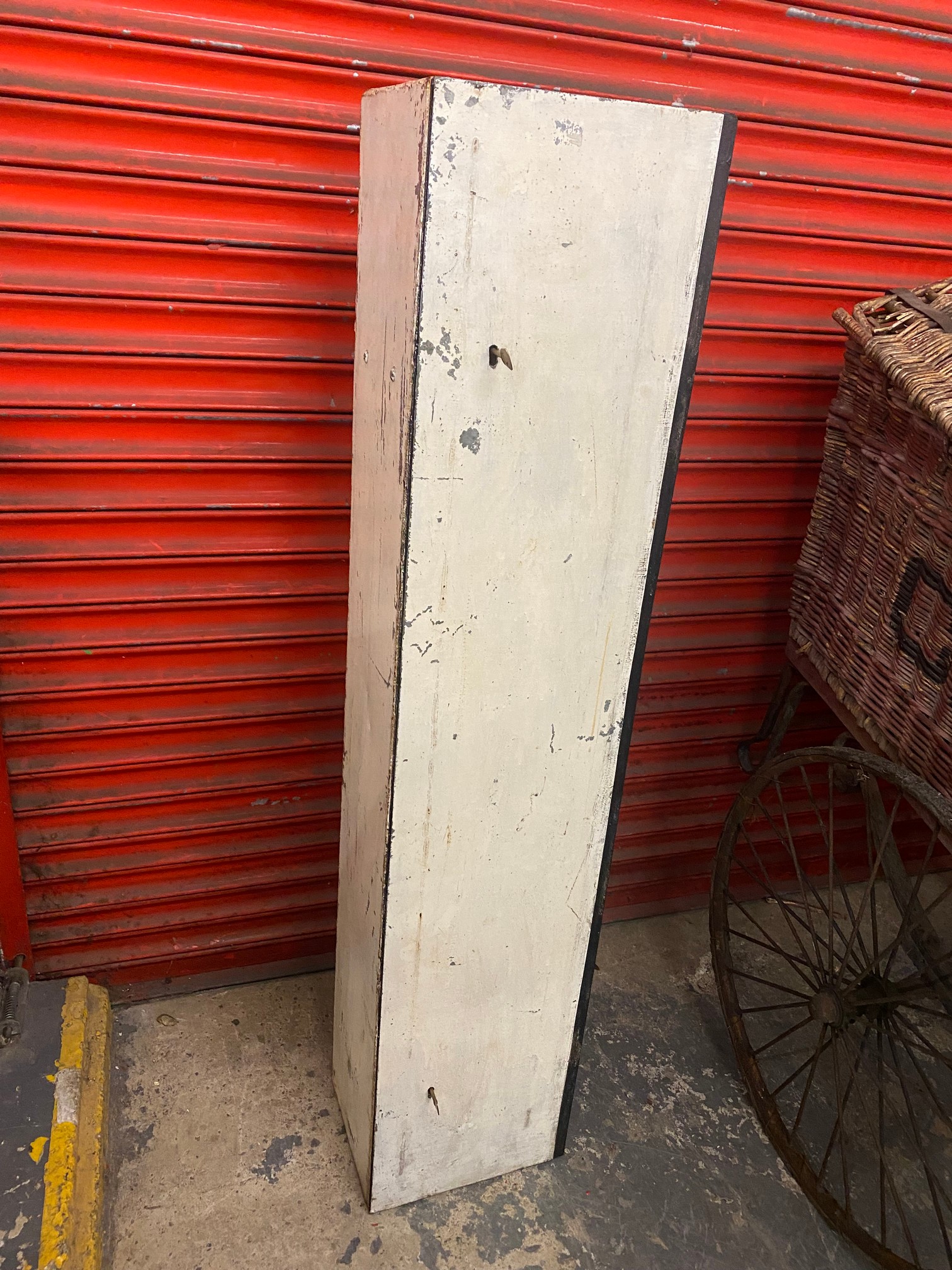 A heavy metal gun cabinet with two locks and keys.