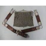 A silver mounted crocodile grained leather belt plus a EPNS chainmail evening bag.