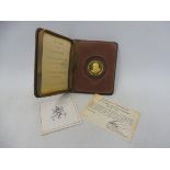 A cased 1974 Turks and Caicos Islands Churchill gold fifty crown proof coin, with certificate and