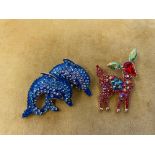 Two Butler & Wilson brooches - Two diving dolphins, w 6cm x h 4.5cm and a deer, h 5cm, brand new