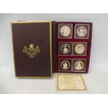 A 1978 Cayman Islands Coronation Regalia Silver Collection, comprising six 25 dollar silver coins,