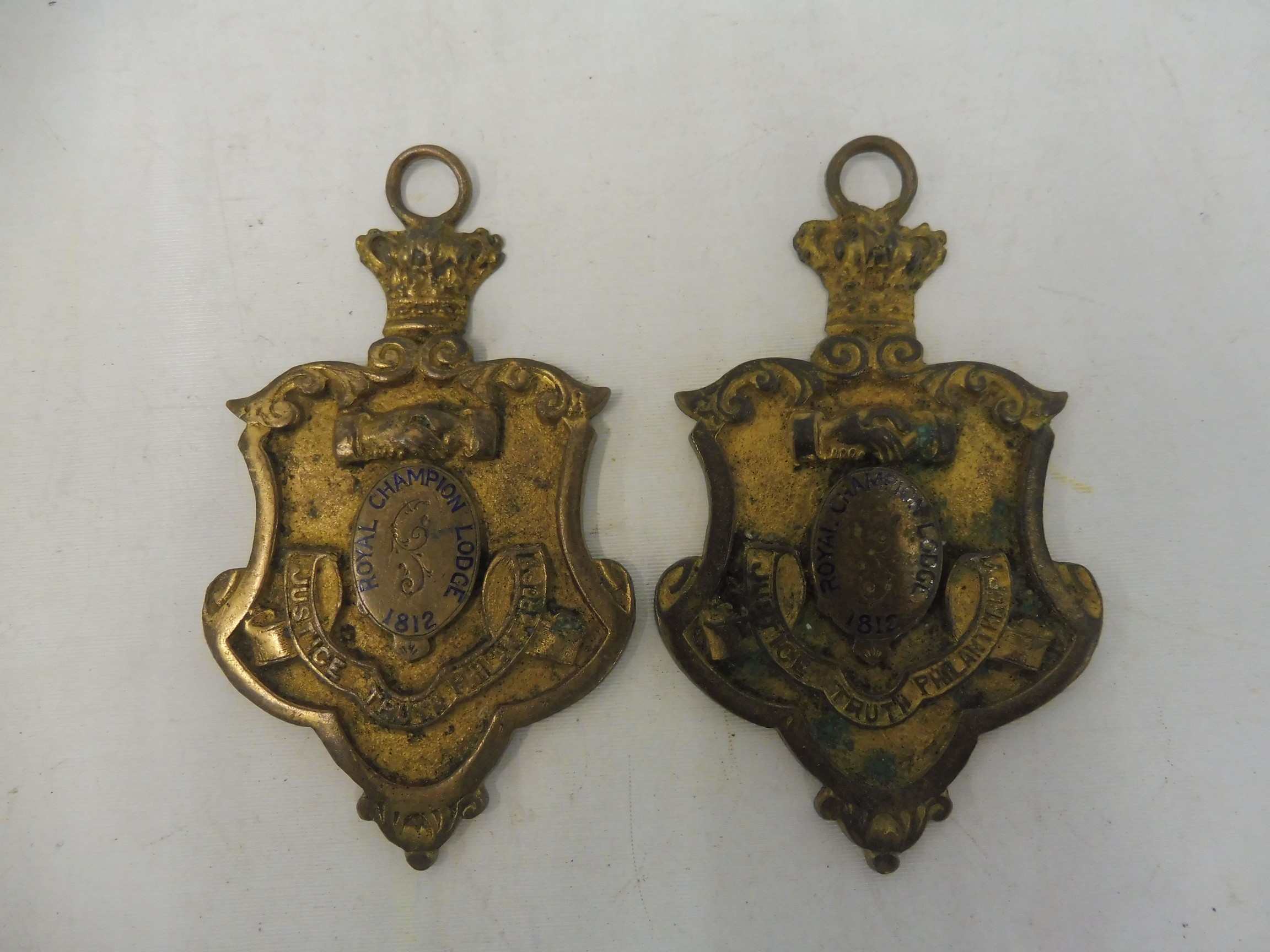 Two Masonic medals, both Royal Champion Lodge 1812, 'Justice Truth Philanthropy'.