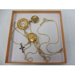 A selection of yellow metal jewellery including a good quality locket.
