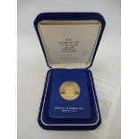 A cased 1980 Franklin Mint Republic of Panama 150 Balboas gold proof coin, with certificate.