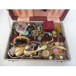 A jewellery box full to the brim with good paste, costume jewellery etc. including brooches,
