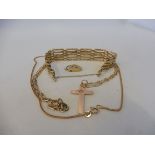 A 9ct gold gate bracelet, a 9ct gold crucifix on chain, a 9ct gold chain plus a 9ct gold padlock