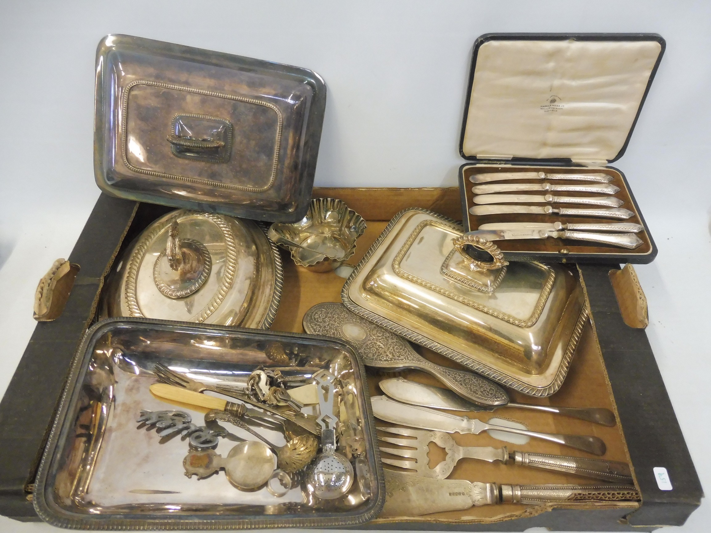 Assorted silver plated items plus a white metal backed brush.