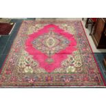 Tribal Rugs; a hand-knotted Persian Kerman carpet, red ground with blue border and central