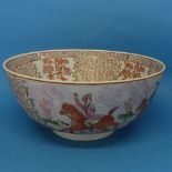 A large Chinese famille rose Punch Bowl, decorated in scenes of villagers, with six character mark