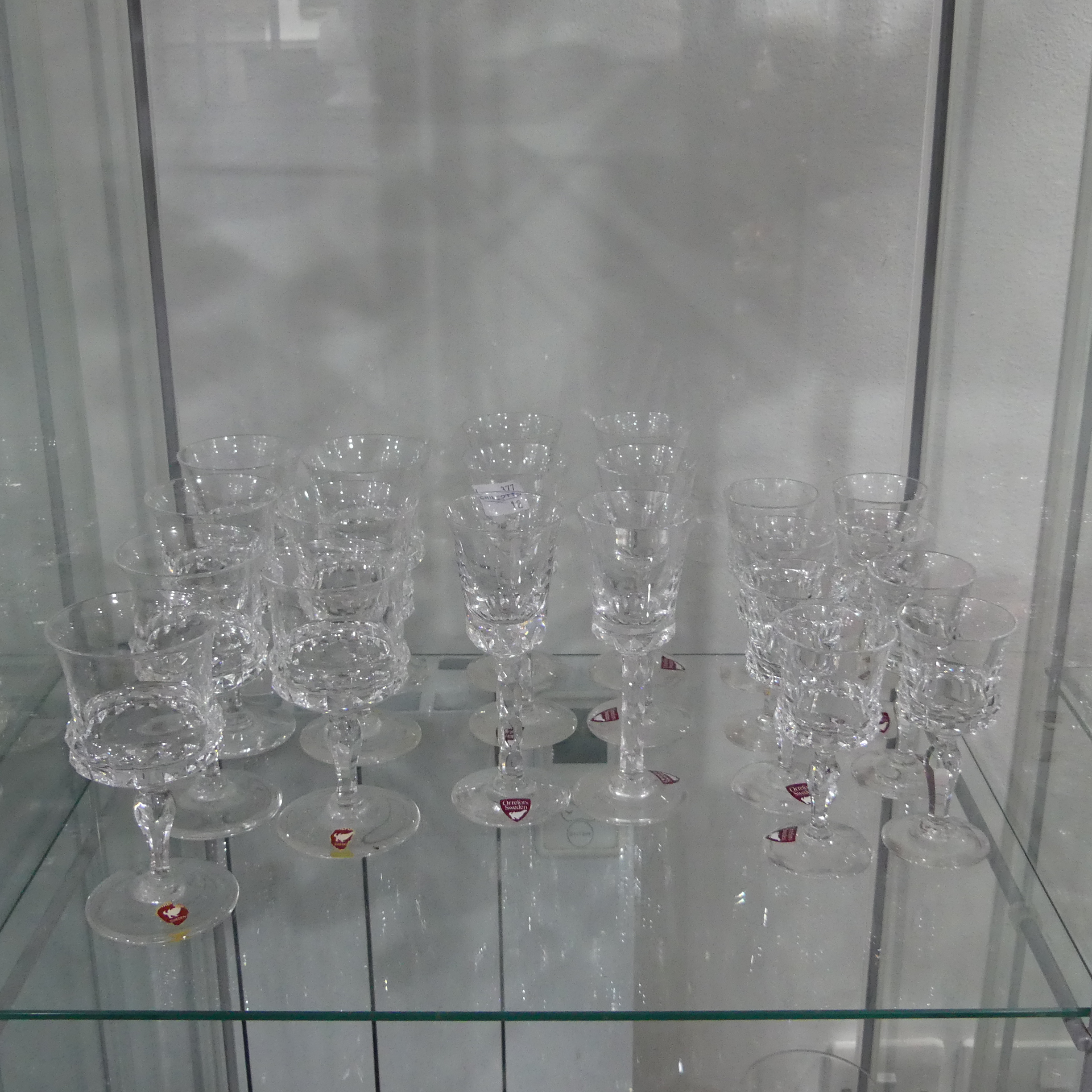 A large quantity of Orrefors Glassware, to include Sherry Glasses, Tumblers, etc, some with