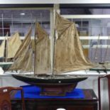 A large early 20thC model of a Sailing Ship, named 'G. Tanner', the fitted deck with canvas sails,