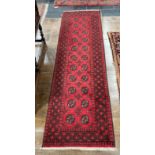 Tribal Rugs: a good red ground Afghan hand knotted Runner, the whole finely woven with tekke and