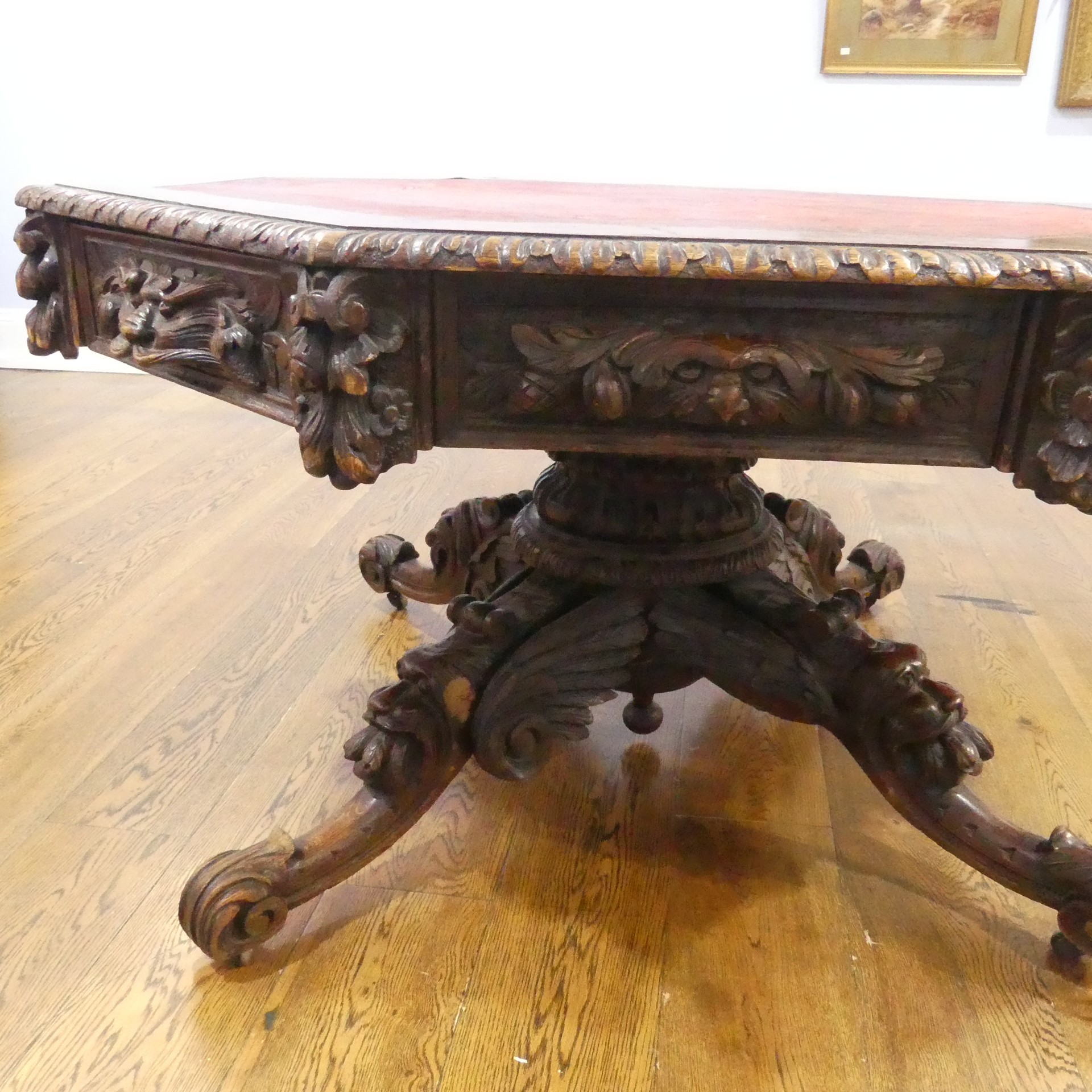 A Victorian heavily carved oak octagonal Drum Table, with octagonal skived in tooled leather top - Image 3 of 7